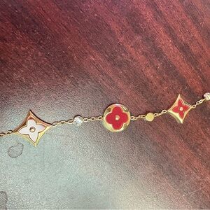 Elegant Gold and Red Floral Bracelet